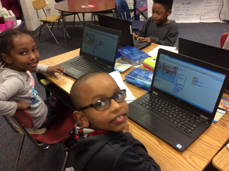 First Graders using Scratch to code at Randolph