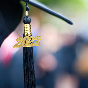 Closeup of a 2022 Graduation Tassel at a graduation ceremony.