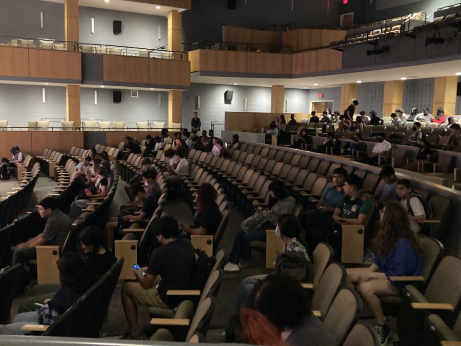 students gathered in auditorium on first day of school