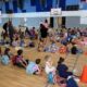 students gathered in gym on the first day of school