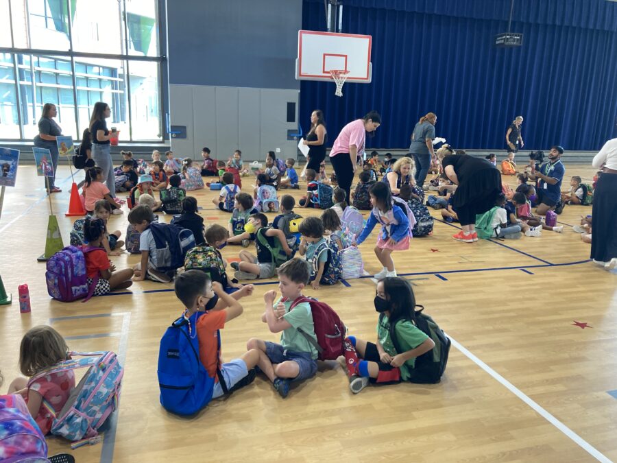 students gathered in gym on the first day of school