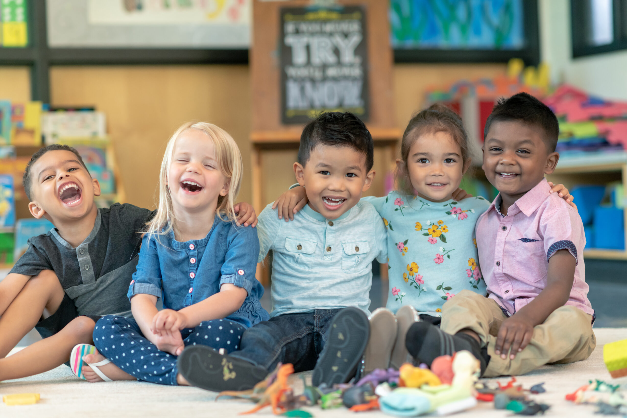 happy multi-ethnic group of preschool students