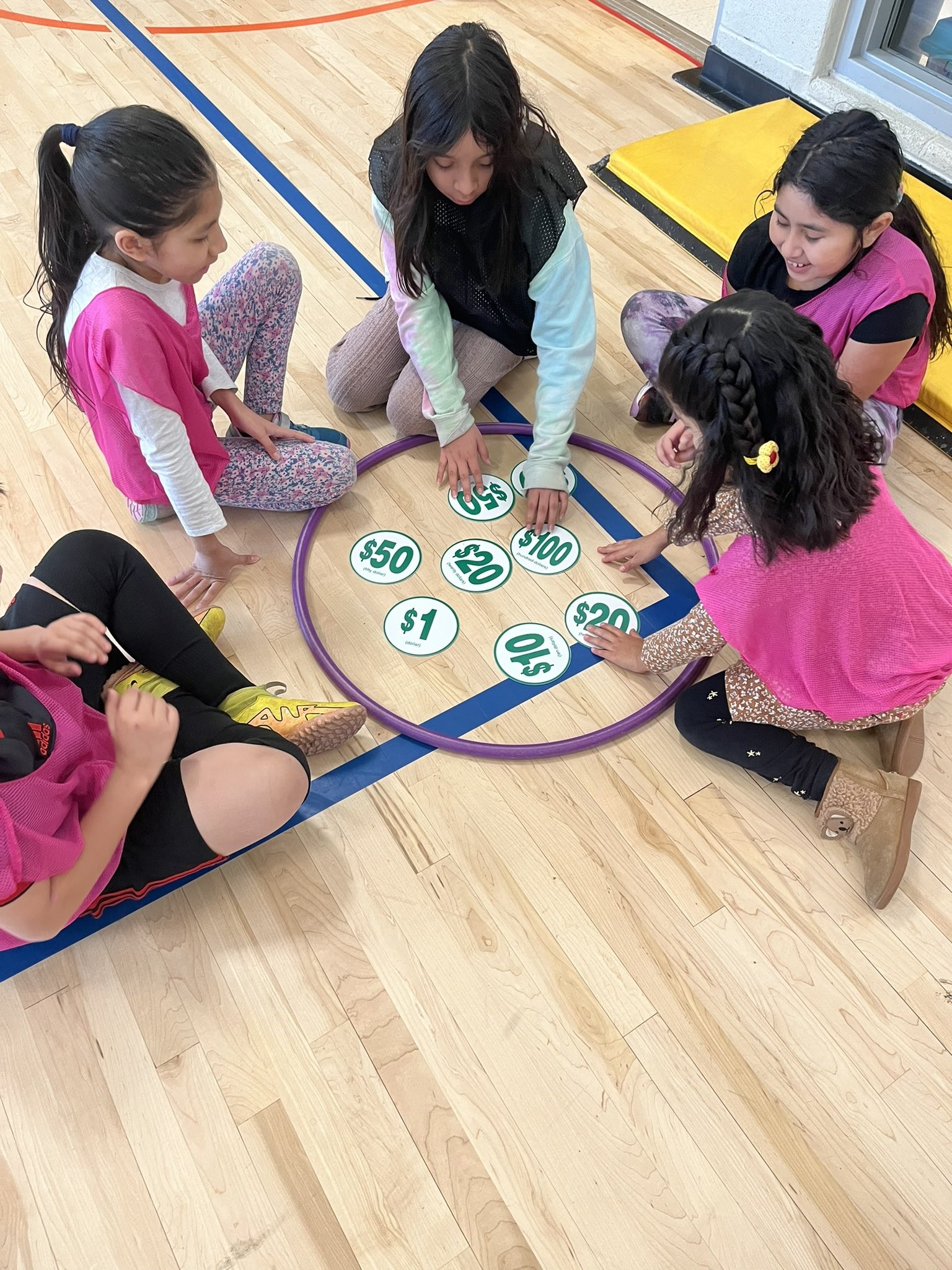 Project YES students playing a game on gym floor