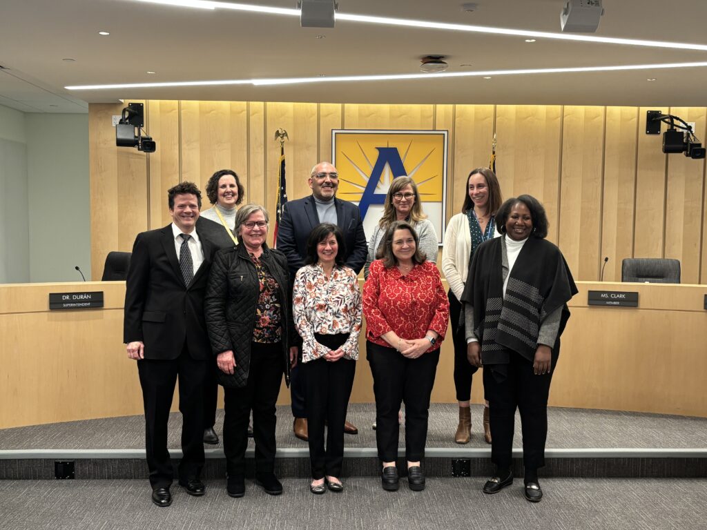 group of staff posing for photo.