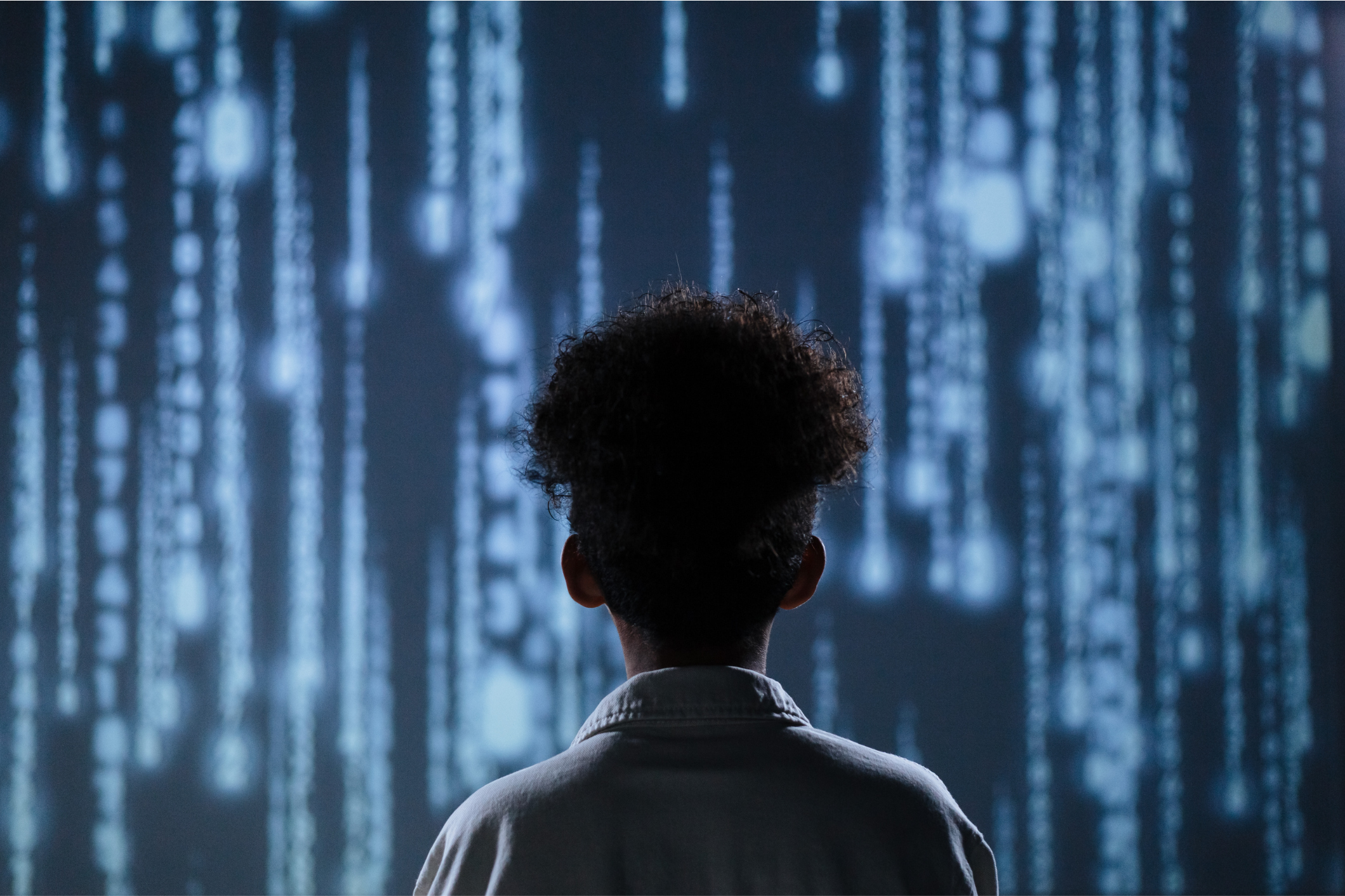 Boy staring at Code in front of him. AI