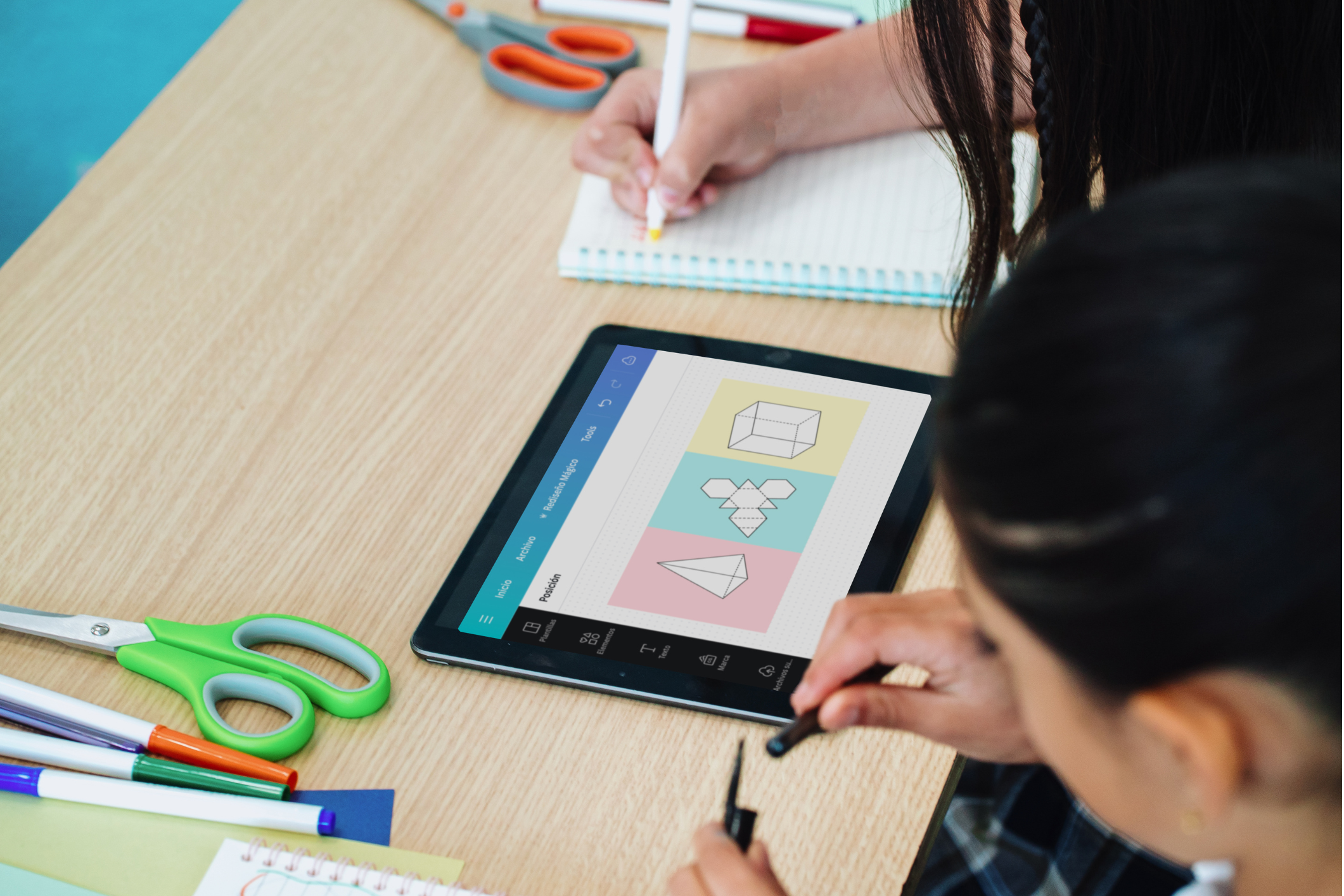 Students learning with an iPad