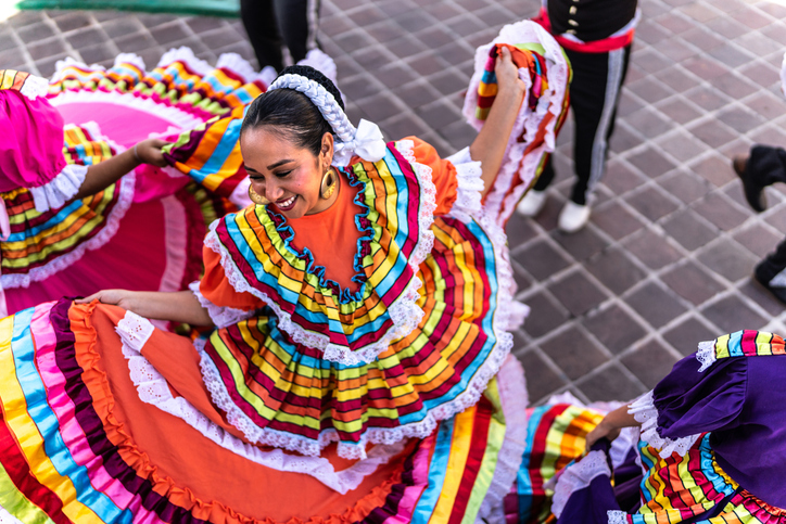 woman dancing in traditional costume