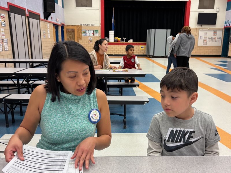 Readers Rise volunteers and students