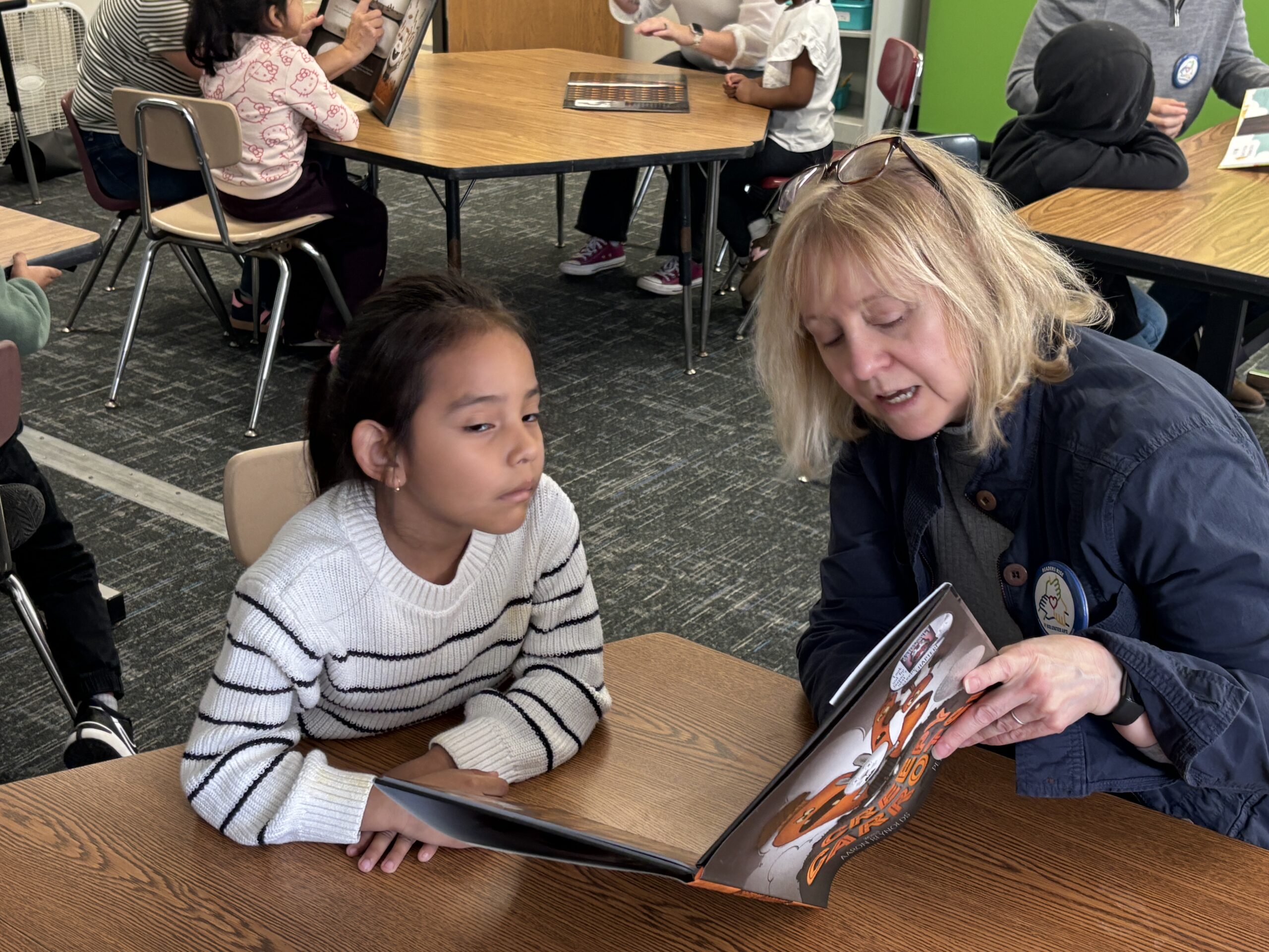 Readers Rise volunteers and students