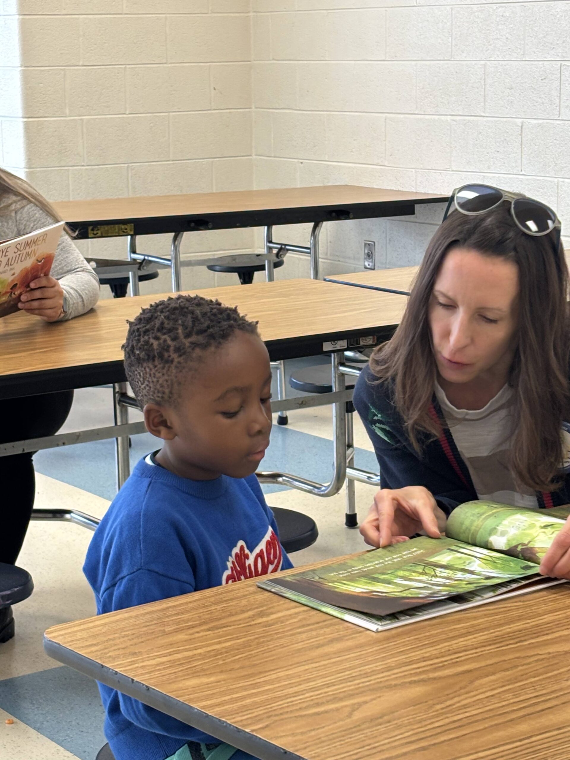 Readers Rise volunteers and students