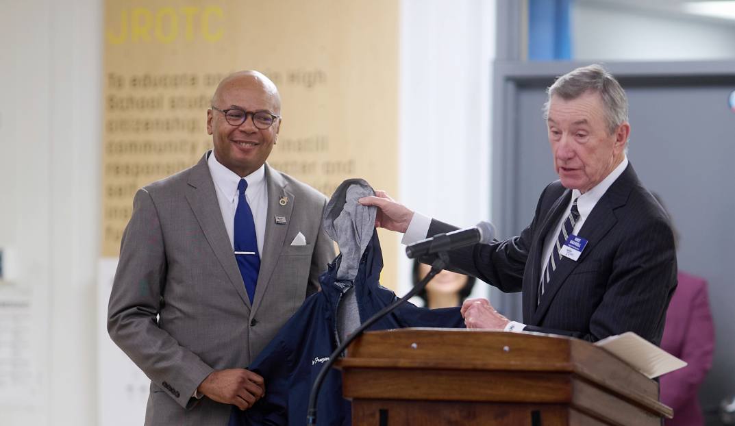 Mr Frazier receiving award