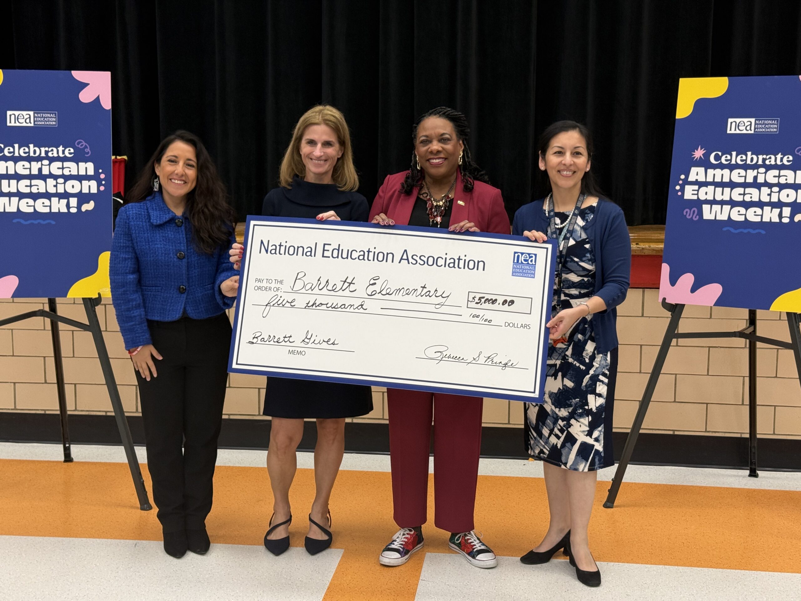 NEA presents check to APS