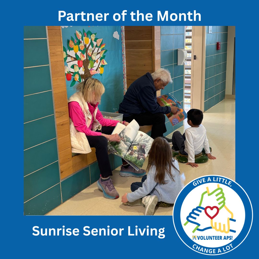 Senior citizens reading to Ashlawn students