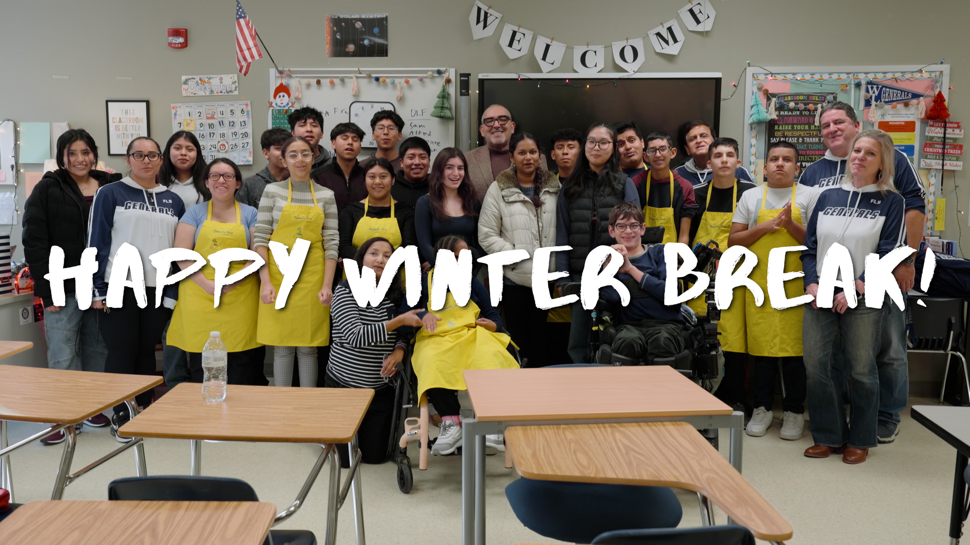 Students in a classroom with Dr. Duran, with the words Happy Winter Break