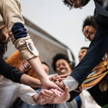 adults shaking hands